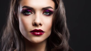 luxurious and mysterious beauty in Noir style, a portrait on a black background,