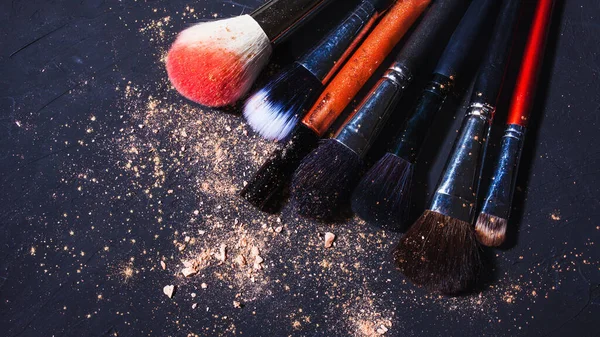 Cosmetics and makeup brushes, professional brushes and eye shadow