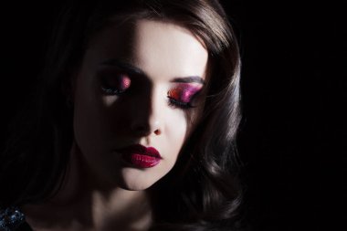 luxurious and mysterious beauty in Noir style, a portrait on a black background,