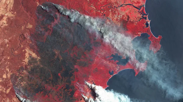 Avustralya 'da orman yangınları, uzaydan bir manzara. Çevresel sorunlar, ormanda büyük bir yangın.,