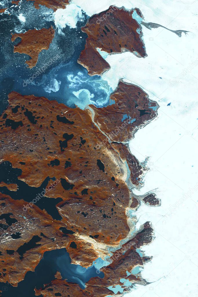 Beautiful and harsh Northern nature, satellite image. Rocky fjords and glaciers.