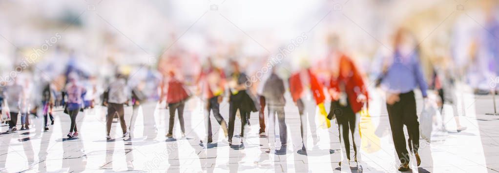 people walking at the city. motion blur 