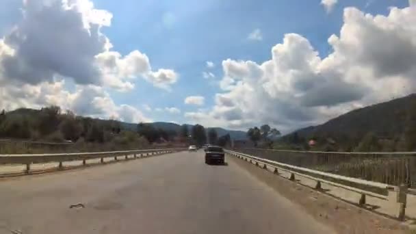 Driving on the highway in the mountains. — Stock Video