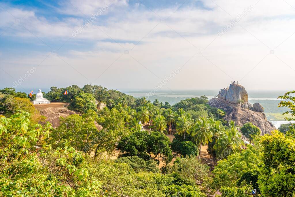 View at the Buddha Statue and Aradhana Gala rock in Mihintale, Sri Lanka