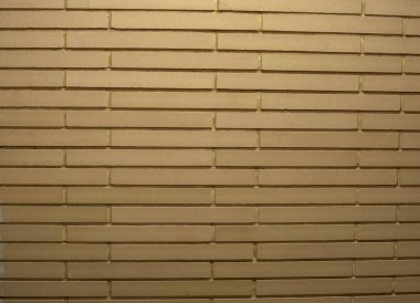 Çok uzun kum renkli tuğla ile dekoratif tuğla