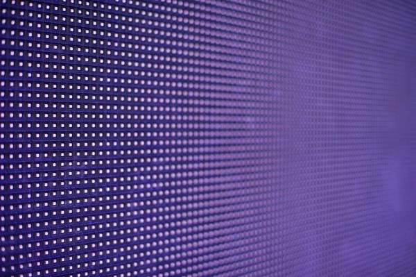 glowing led panel. abstract purple background.