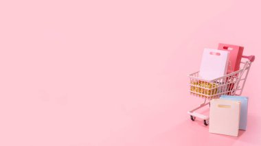 Geleneksel alışveriş sezonu konsepti - soluk pembe arka planda izole edilmiş kağıt çanta dolu mini pembe alışveriş arabası, boş fotokopi alanı, kapat