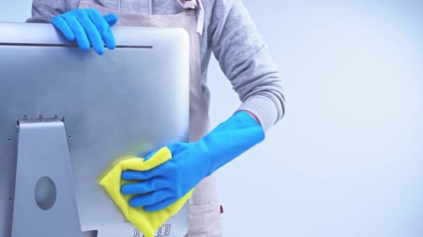 Young Woman Housekeeper Apron Cleaning Wiping Office Computer Surface Blue — Stock Video