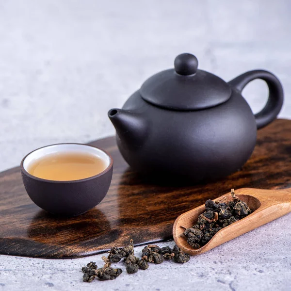 Hot Tea Black Teapot Cups Dry Tea Leaves Bright Gray Royalty Free Stock Images