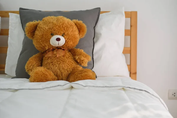 Teddy bear on the bed