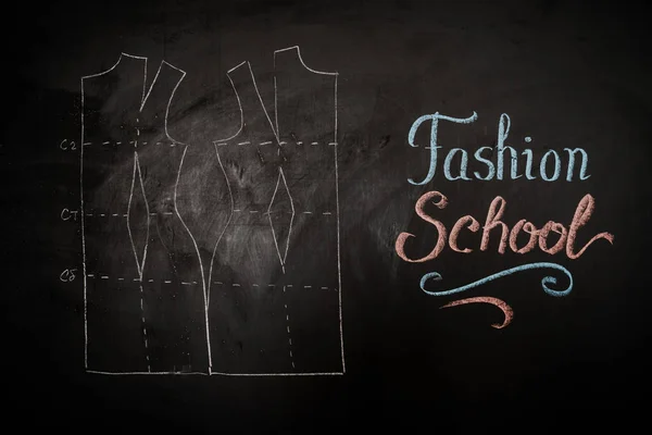 Fashion school. Drawing of a pattern on a blackboard in a design studio for sewing and tailoring, special education concept, place for insertion