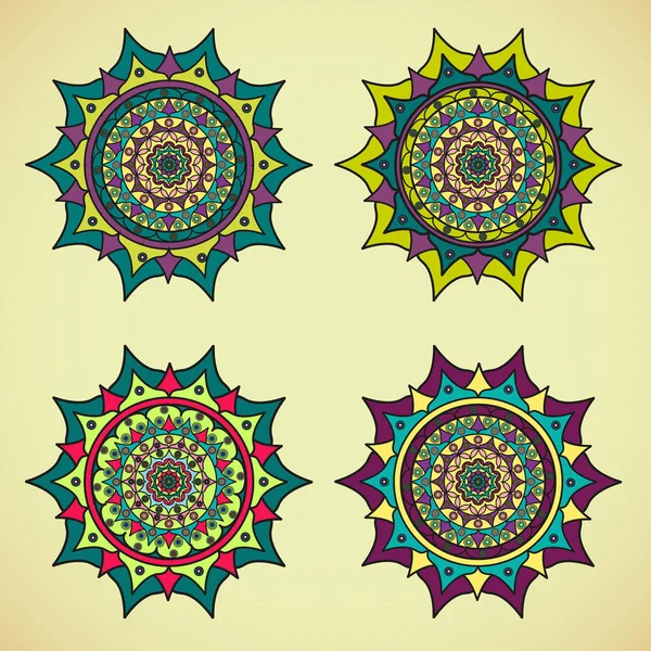 Quatro mandalas coloridas em um fundo claro — Vetor de Stock