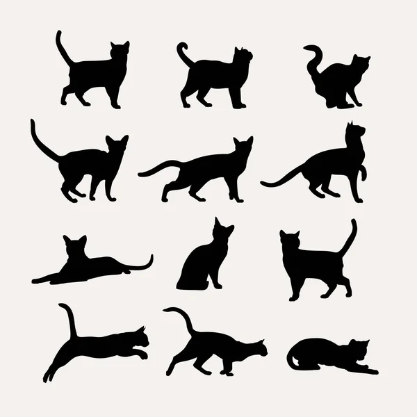 Siluetas vectoriales de gatos — Vector de stock