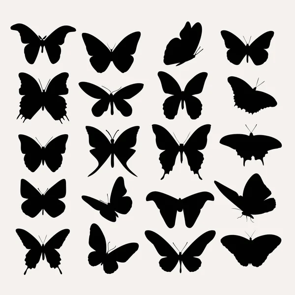 Siluetas vectoriales de mariposa — Vector de stock