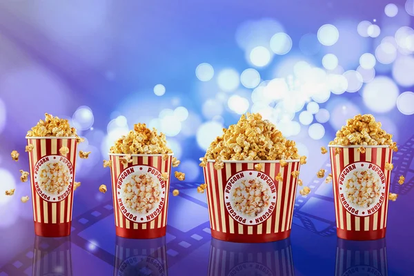 Fyra Papperskoppar Med Popcorn Blå Abstrakt Bakgrund Med Bokeh Glasögon — Stockfoto