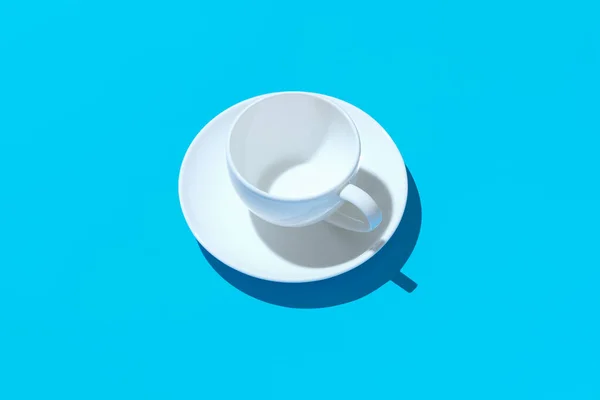 Kaffeetasse auf blauem Hintergrund — Stockfoto