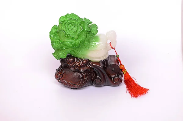 Lettuce ceramic honoring of Chinese people believers.