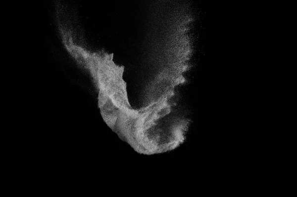 Congelar o movimento de partículas brancas no preto — Fotografia de Stock