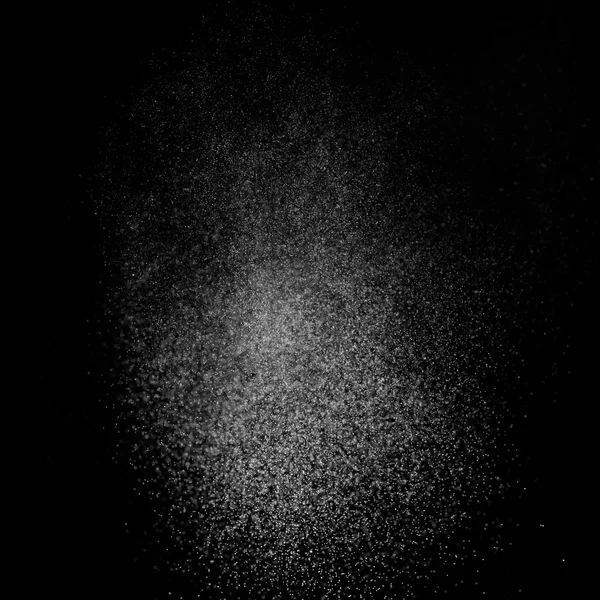 Kare siyah bir zemin üzerine su soyut sıçraması.