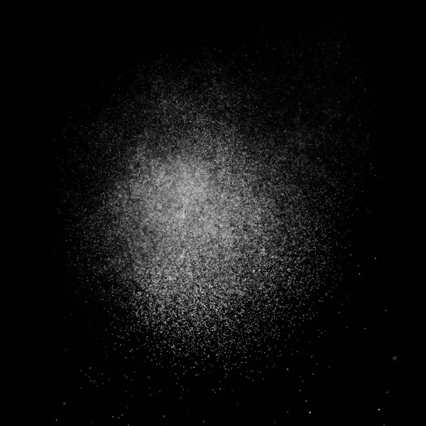 Kare siyah bir zemin üzerine su soyut sıçraması.