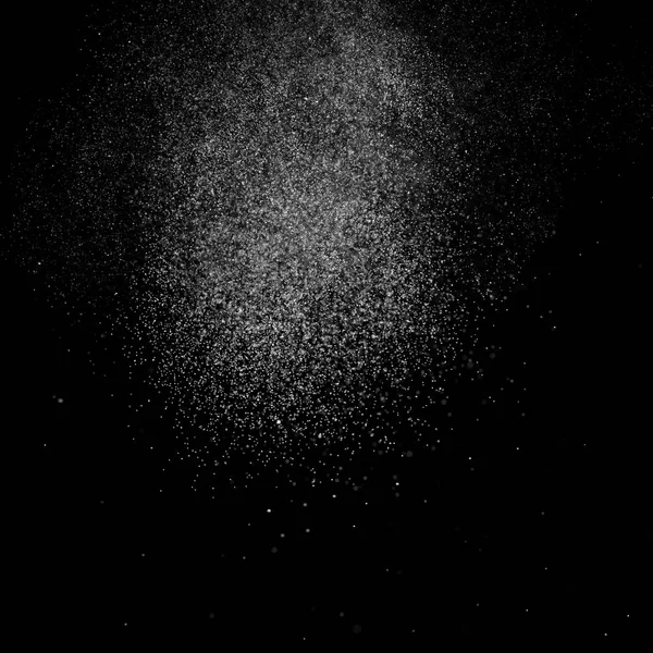 Kare siyah bir zemin üzerine su soyut sıçraması.