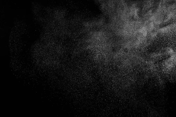 Movimento di congelamento di particelle bianche su sfondo nero . — Foto Stock