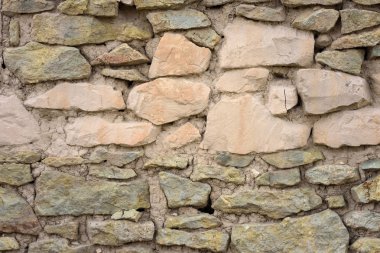 Duvar doğal taş ve kil.