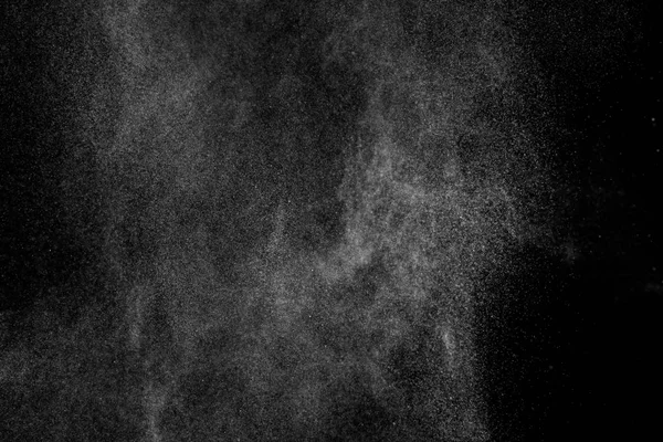 Siyah arkaplanda soyut su sıçramaları.