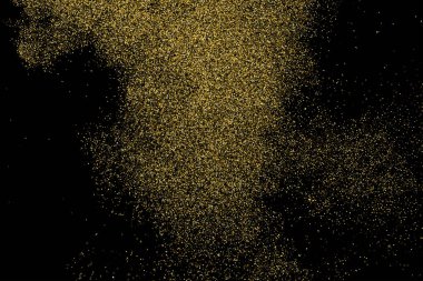Altın glitter doku siyah izole. Amber parçacıklar renk. Kutlama arka plan. Konfeti altın patlama.