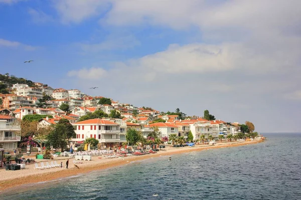 Scenic view to small town on hillside and coastline of Kinali island,one of Prince Islands in Sea of Marmara next to Istanbul. The Princes Islands (Turkish - Prens Adalar or Kzl Adalar),Turkey