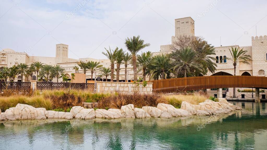 Scenic view to stunning tourist walking area with  beautiful channels with sea water in Madinat Jumeirah luxury resort zone. Dubai,UAE