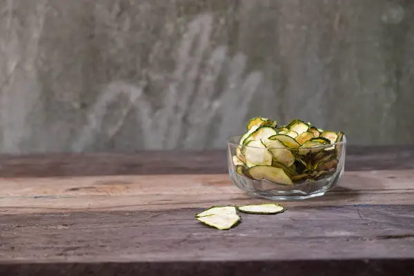 Dried zucchini in a wood bowl — Stock Photo, Image