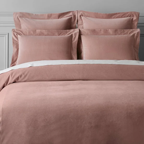 Pink color bed sheets and pillows