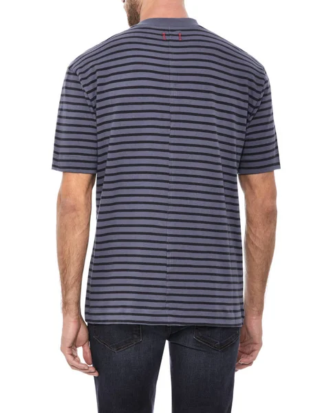 Casual men’s blue T-shirt with horizontal lines paired with dark blue denim with white background — ストック写真