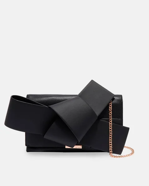 Cartera de diseño de cara de gato elegante negro con fondo blanco — Foto de Stock