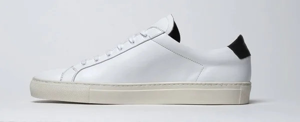 Casual white sneakers for men’s with white base with white background