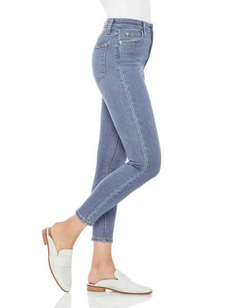 Casual blue denim for women’s paired with beautiful pair of heels and white background
