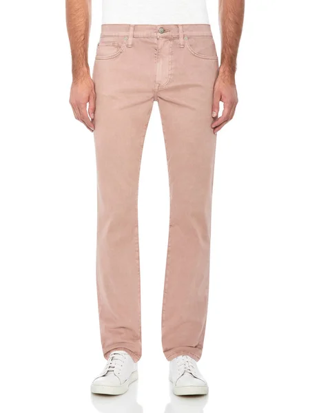 Pantaloni de culoare subțire potriviți, asociați cu tricou alb și adidași albi cu fundal alb — Fotografie, imagine de stoc