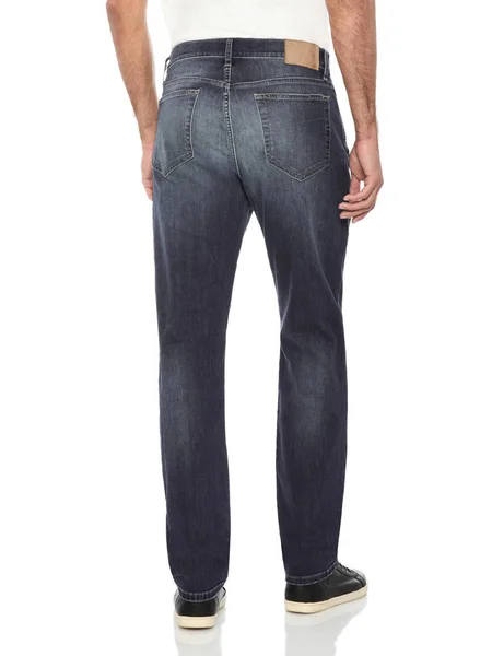 Herren normale dehnbare dunkelblaue Slim Fit Jeans mit weißem Hintergrund, lässige schwarze Jeans für Herren gepaart mit weißen Turnschuhen mit weißem Hintergrund, lässige blaue Jeans für Herren gepaart mit schwarzen Schuhen — Stockfoto