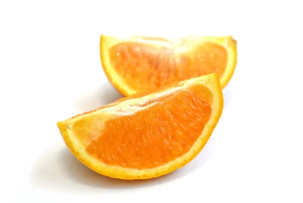 Two slices of orange on a white background — Stock Photo, Image