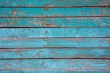 Soluk yatay tahtaları olan turkuaz eski ahşap arka plan. Kırsal biçim