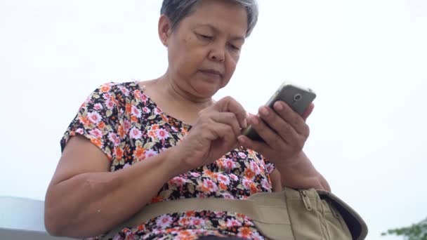 Asian senior woman using smart phone, Happy asian old — Stock Video