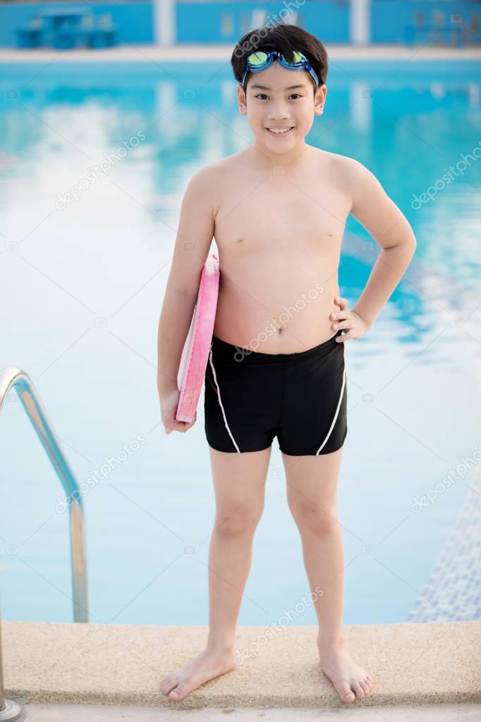 Asian boys in swimsuits