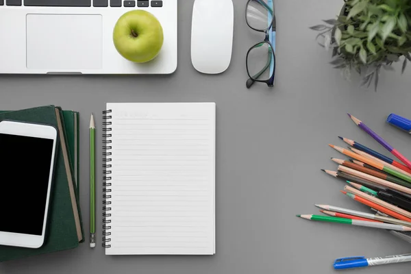 Top view, flat lay of Modern gray office desk table with laptop — Stock Photo, Image