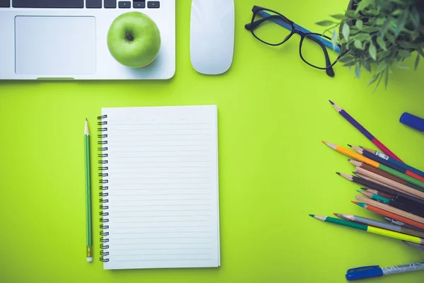 Office desk table with laptop and supplies. — Stock Photo, Image