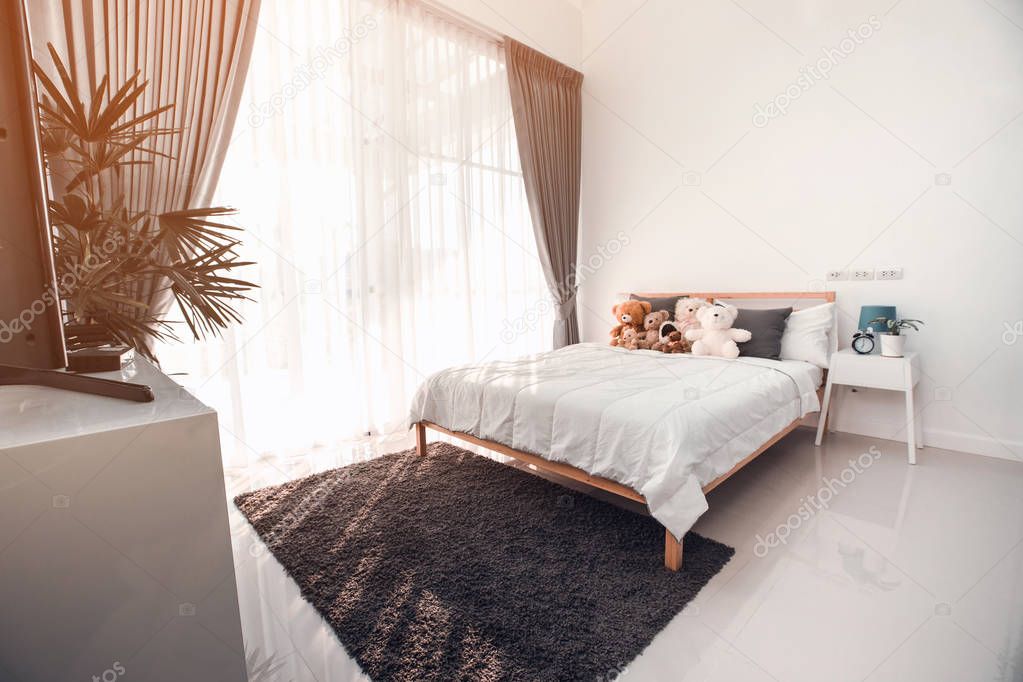 Empty white room interior with bed,
