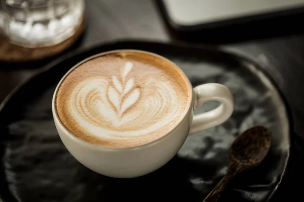 Šálek kávy latte art — Stock fotografie