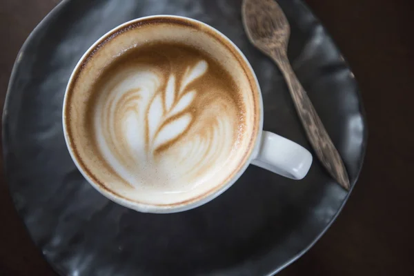 Koffiekopje latte art — Stockfoto