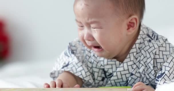 Cute Asian Crying Baby Boy Lying Playing Portrait Crawling Baby — Stock Video