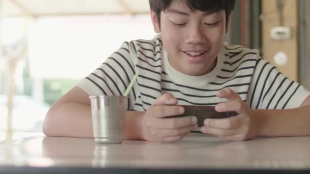 Child Boy Playing Mobile Phone Cafe Kid Using Smartphone Smile — Stock Video